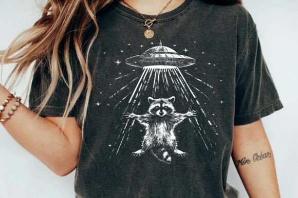 Embrace the Absurd: The Funny Raccoon UFO Graphic